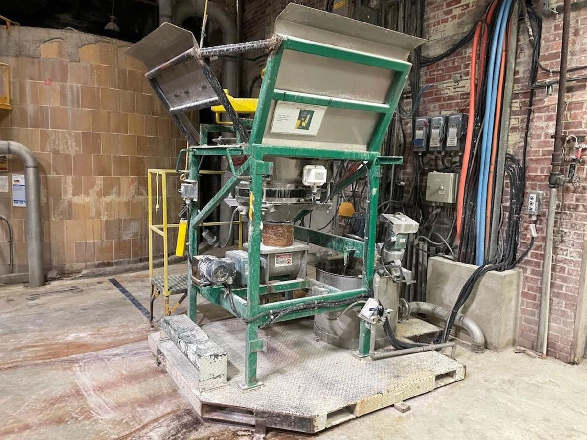 28 IN VIBRATORY CONE FUNNEL WITH 30 IN DIAMETER RECEIVING TANK