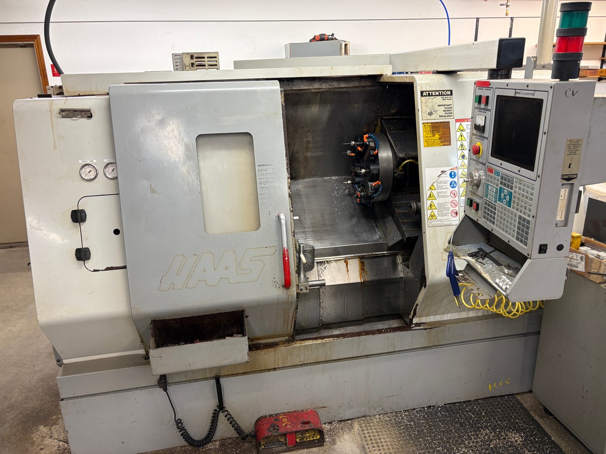 HAAS #SL20T CNC Lathe w/ 8" Chuck, 10 Place Tool Holder, Chip Conveyor, Control Panel (See